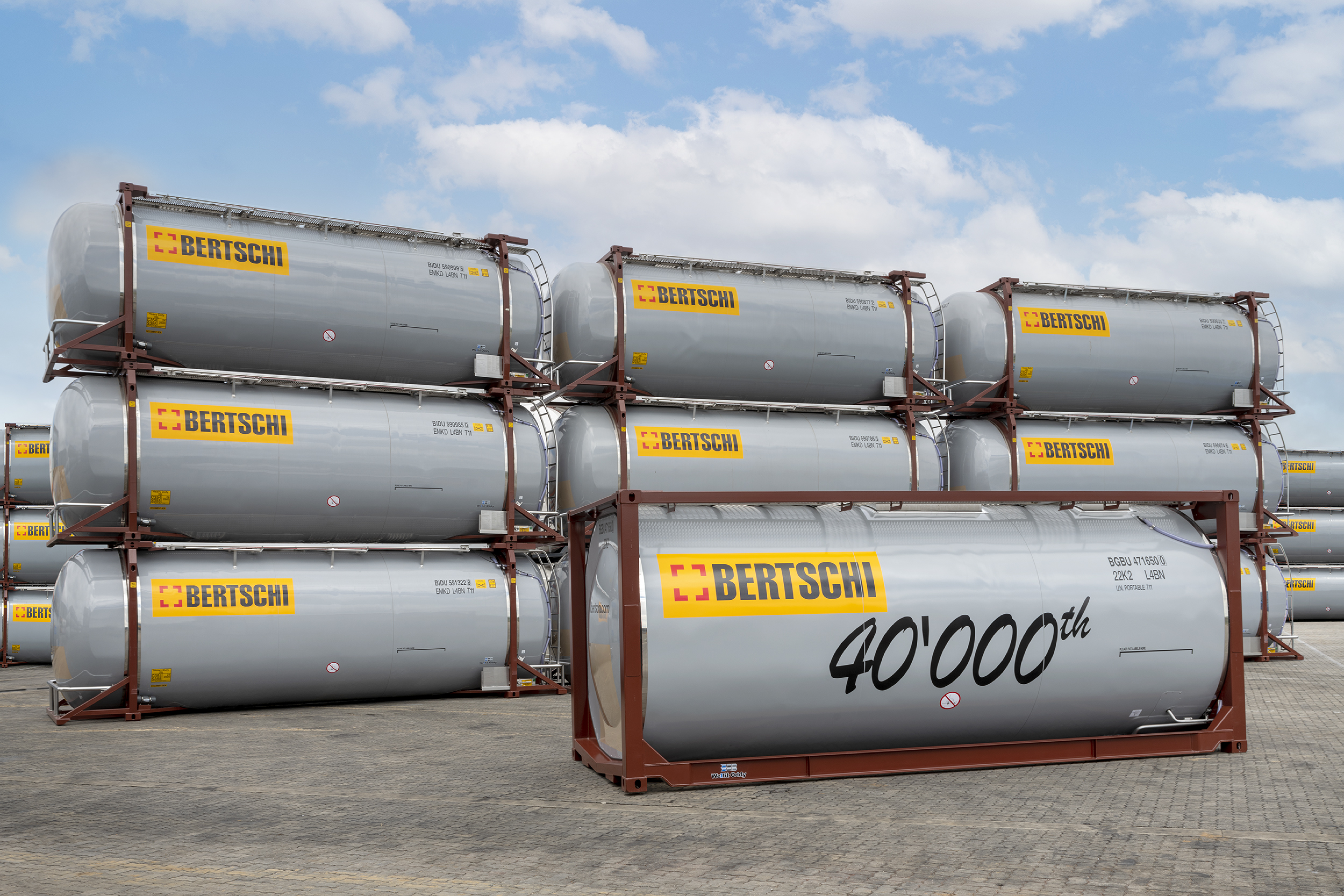 Bertschi's 40,000th container standing in front of other brand new tank containers