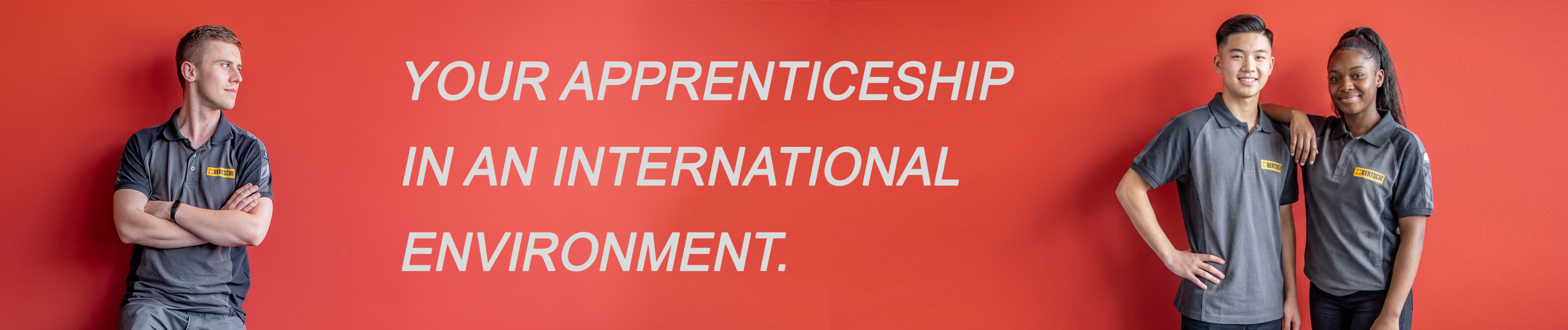 Red banner with 3 apprentices proudly standing 