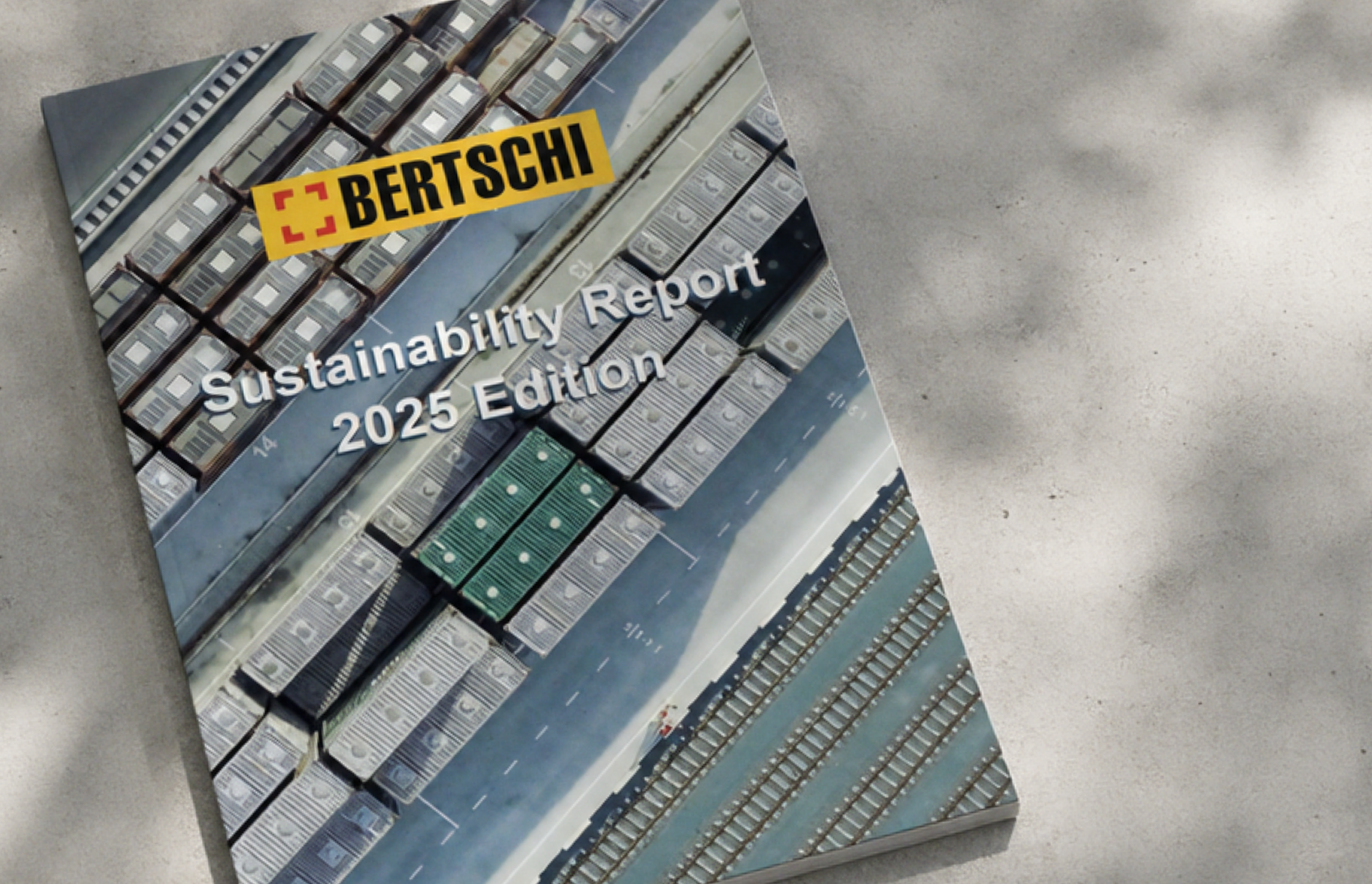 Bertschi Sustainability Report 2025 mockedup on concrete