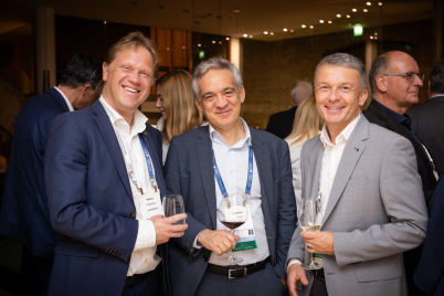 Conference attendees talking during a networking reception at the EPCA Annual Meeting.
