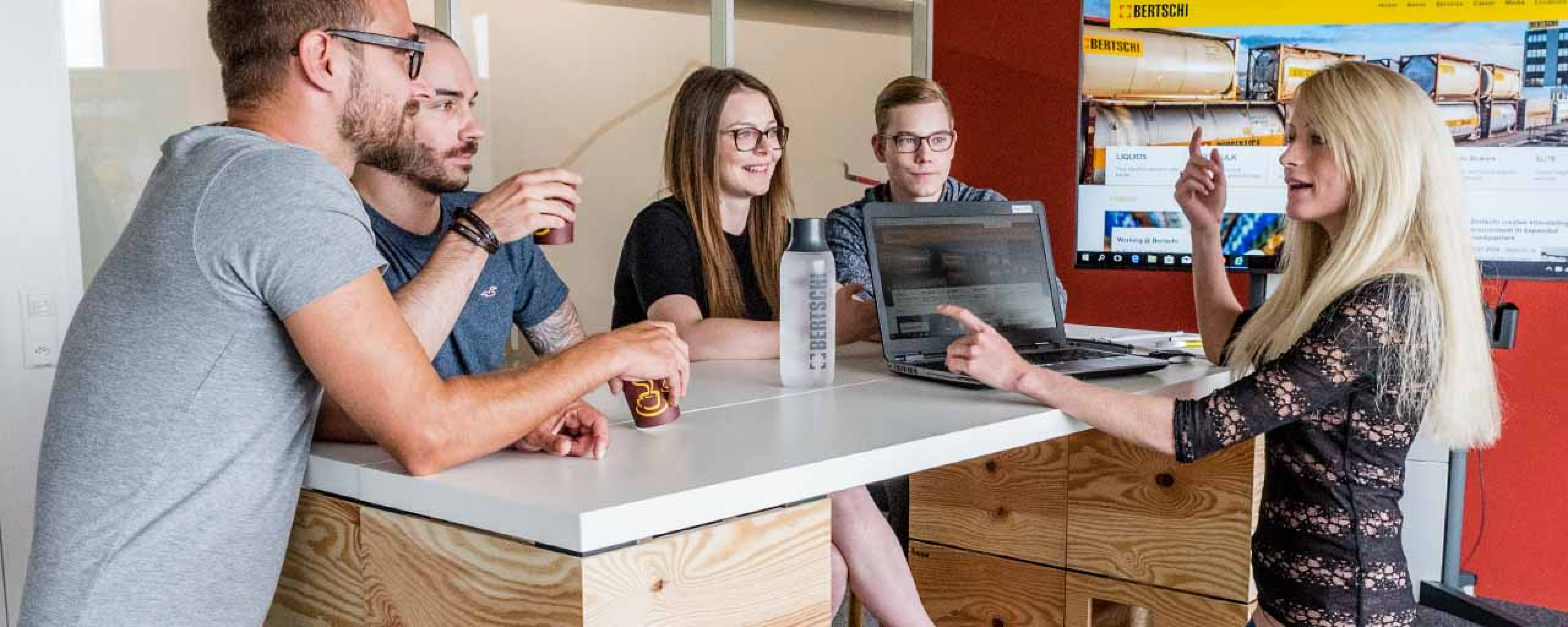Bertschi employees in a meeting