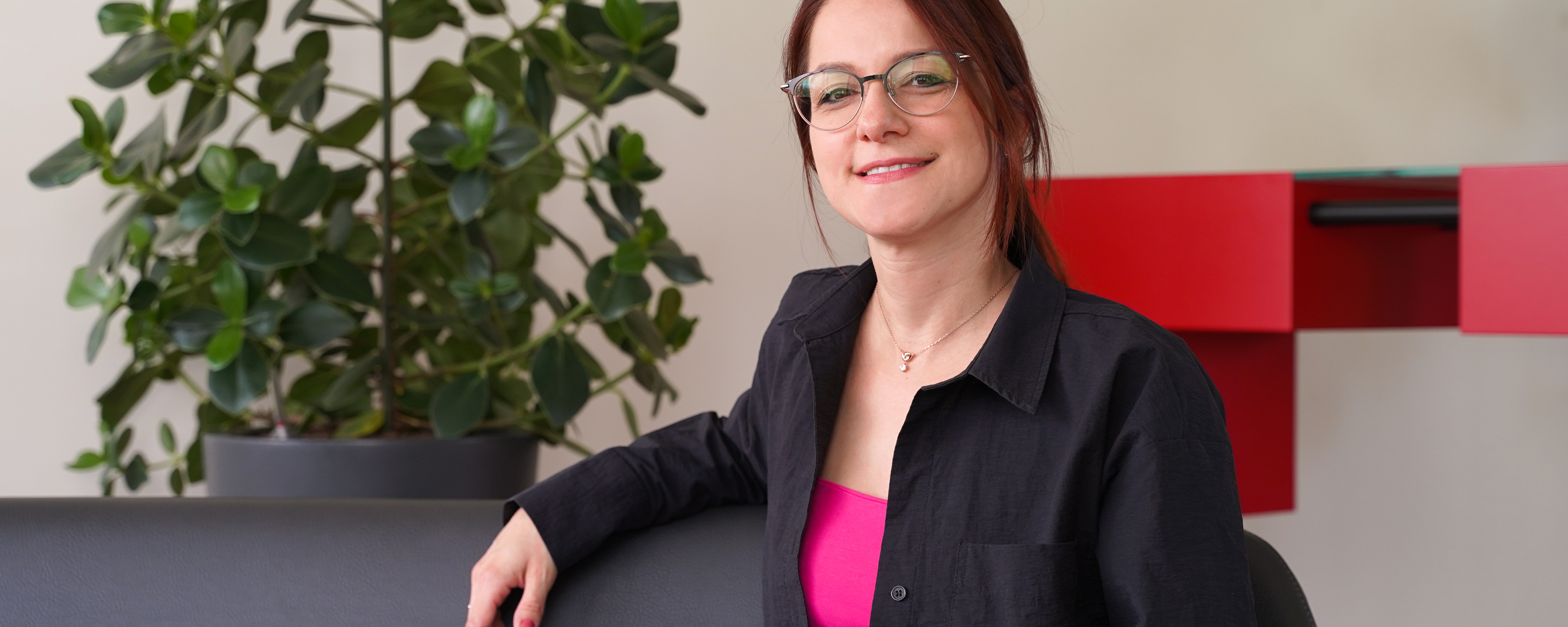 Woman sitting on chair looking confident