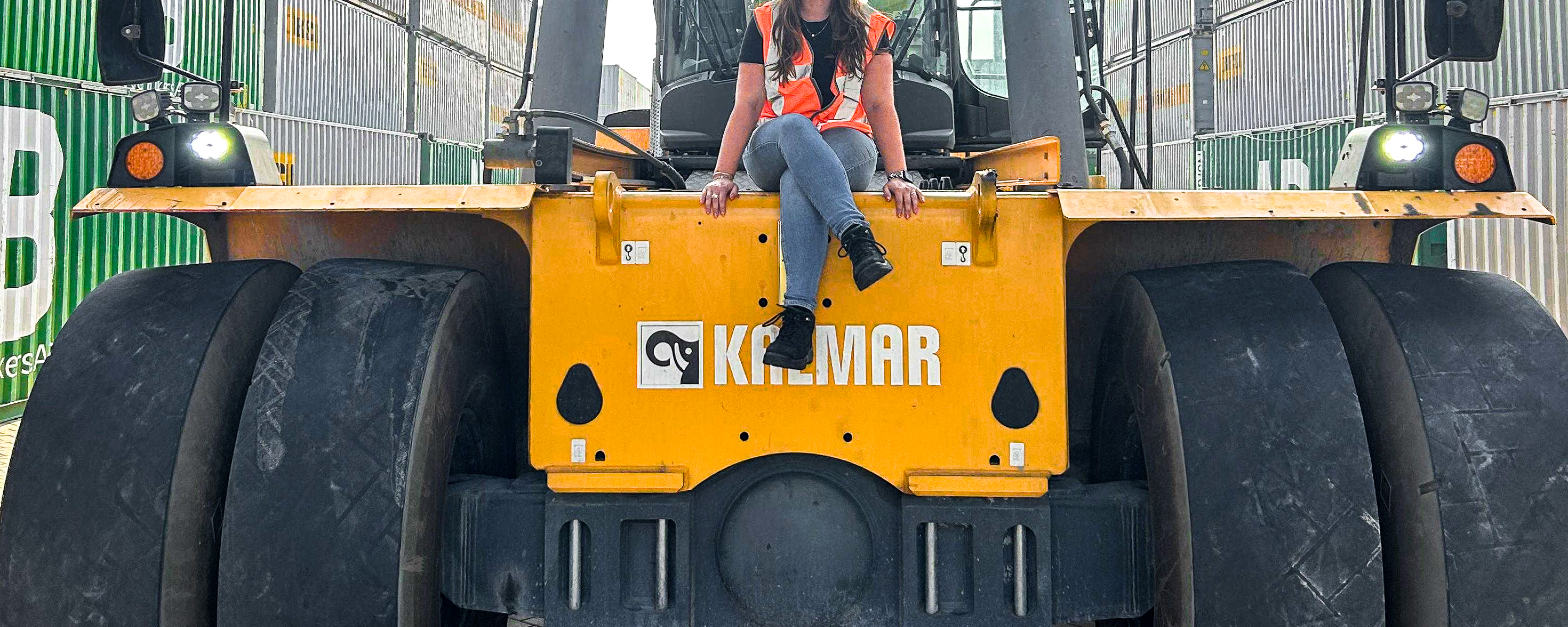 Sascha on the reach stacker female terminal worker