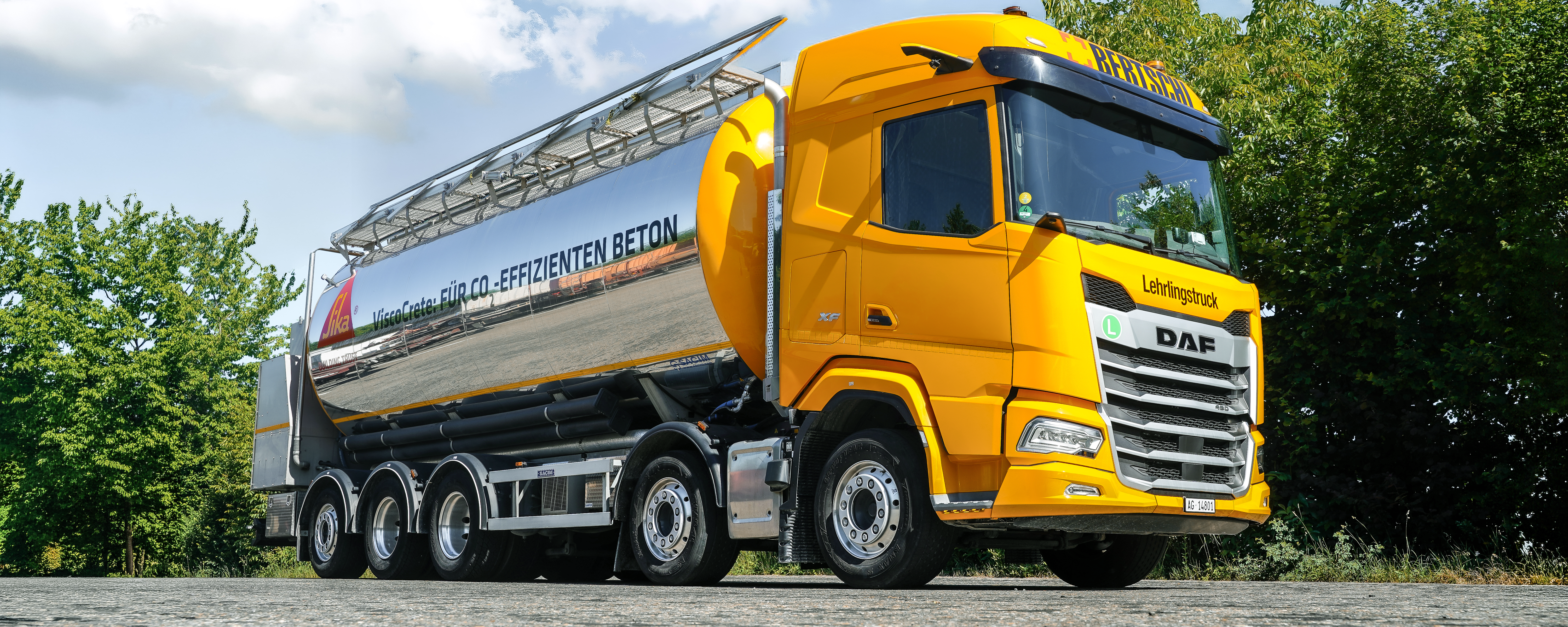 Tank container on truck with Sika logo