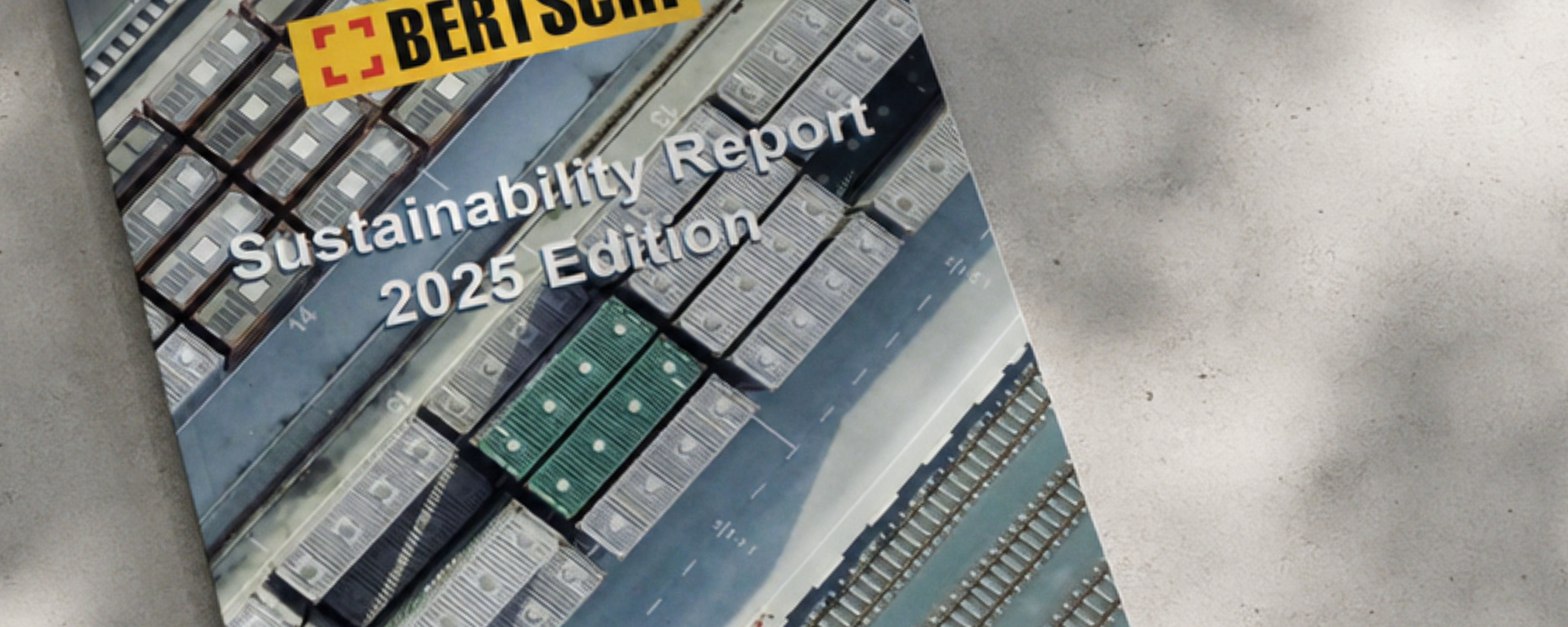 Bertschi Sustainability Report 2025 mockedup on concrete